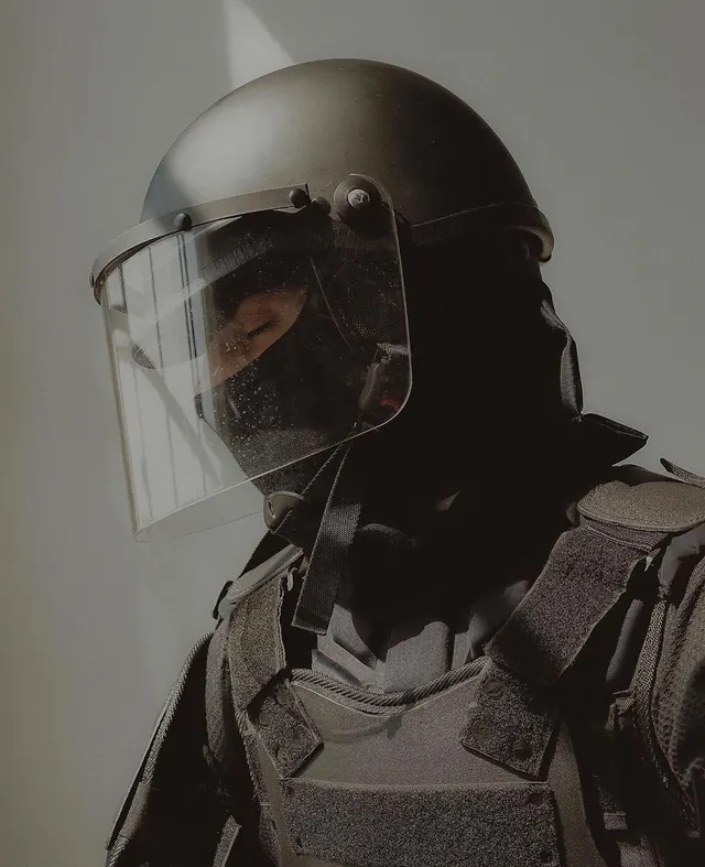 Tactical helmet portrait, technical, photographic, dark