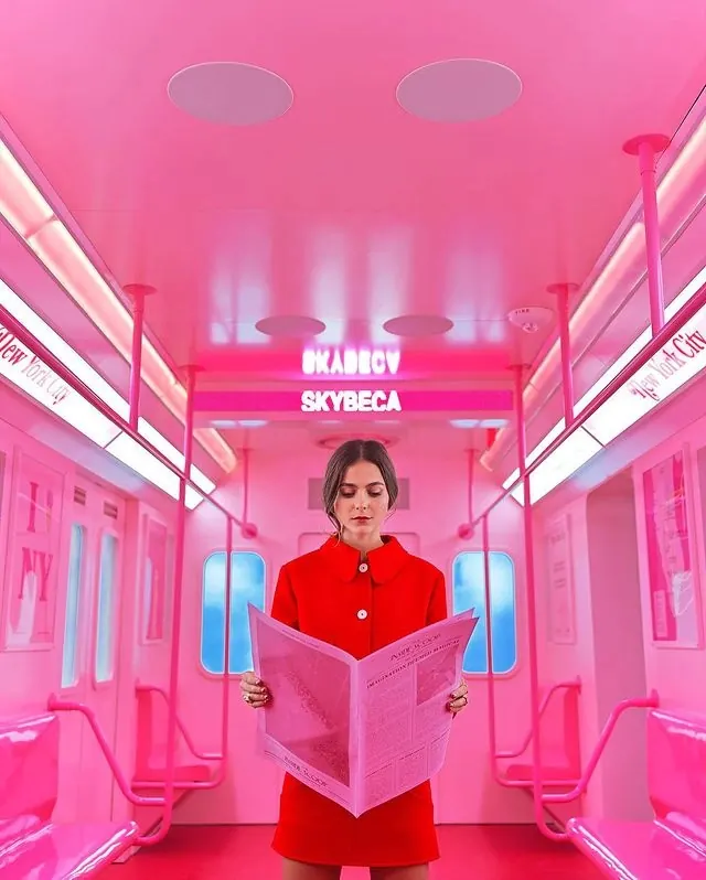 Woman reading in neon-pink subway car, photographic, gradient-heavy, vibrant