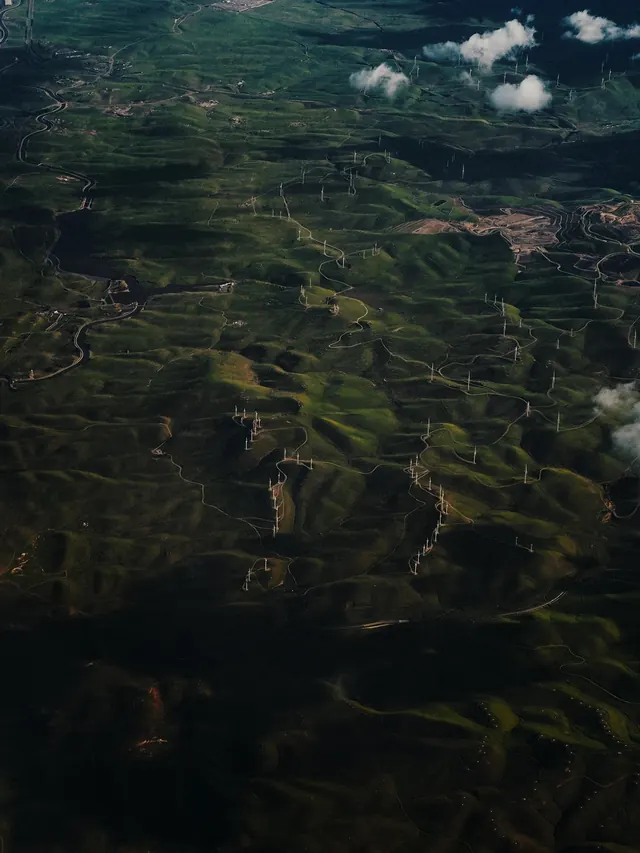 Aerial wind farm landscape, photographic, cool