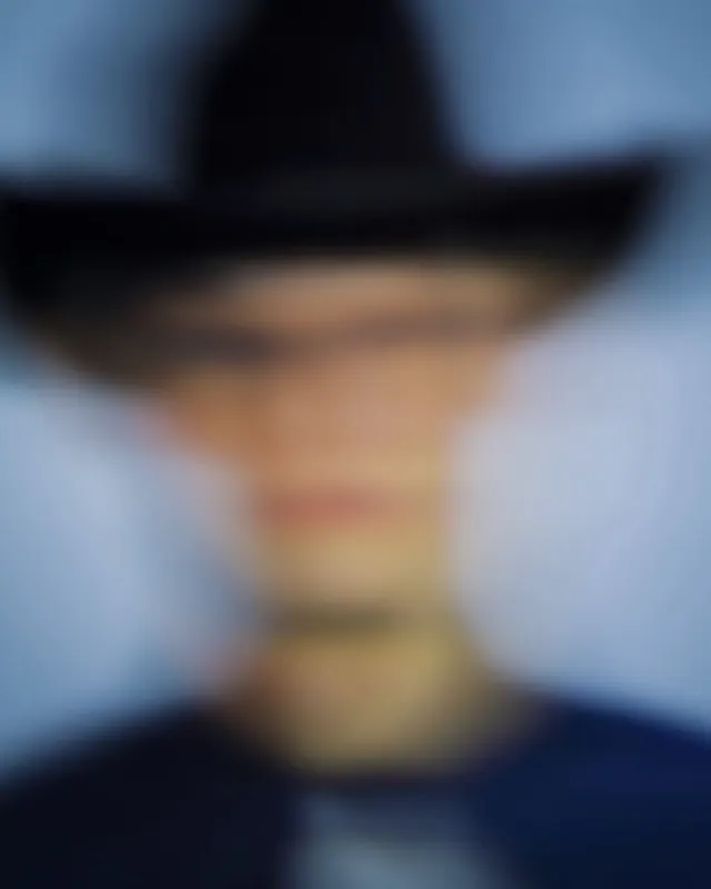 Blurred portrait with dark and warm tones, photographic, cool