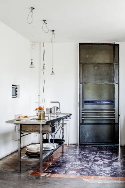 Industrial kitchen interior with pendant lights, minimal, photographic, light