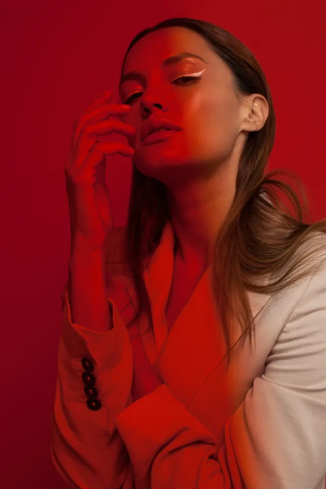 Red monochrome beauty portrait, editorial, photographic, dark