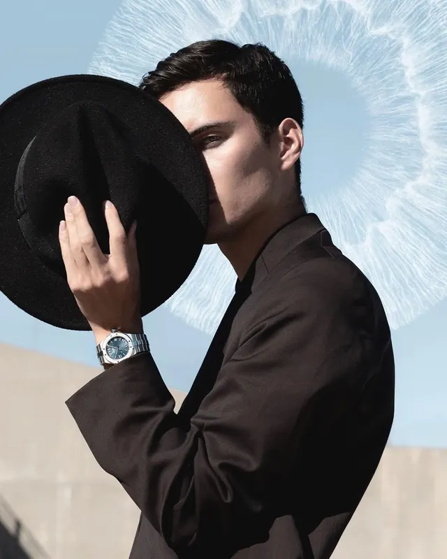 Portrait with black hat and luxury watch, photographic, minimal, dark