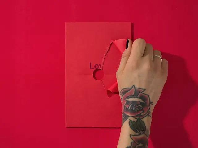 Red envelope design with hand, playful, photographic, vibrant