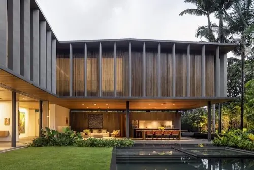 Modern residential exterior with covered patio, photographic, editorial, warm