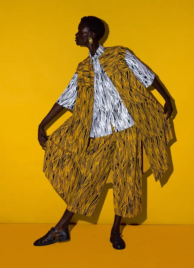 Electric fashion editorial with patterned textiles, illustrated, photographic, vibrant