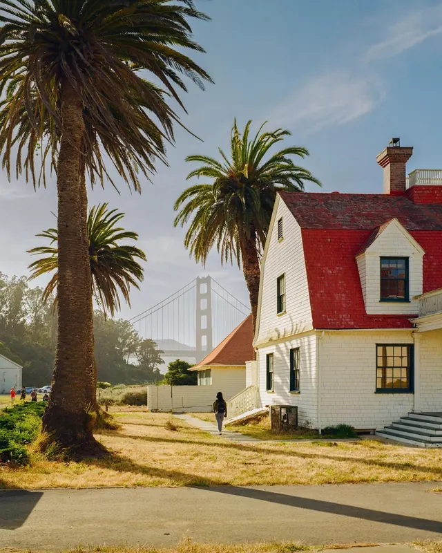 Coastal house photography with palm tree and Golden Gate Bridge, photographic, minimal, warm