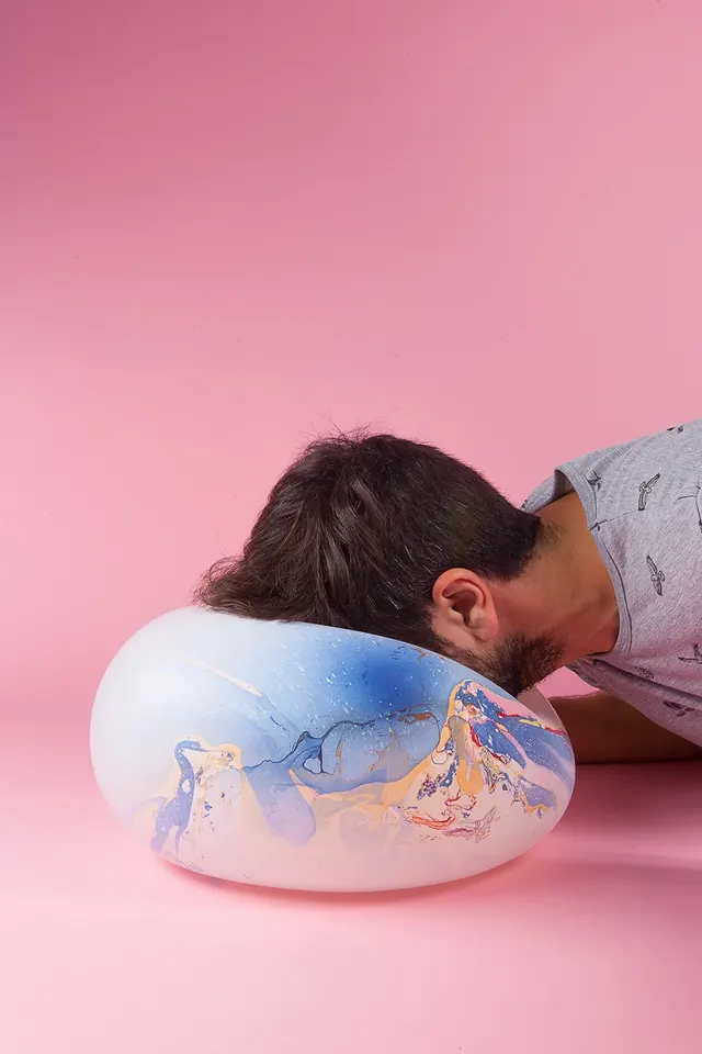 Marbled object portrait on pink background, photographic, minimal, pastel