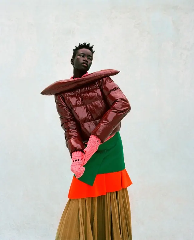 Colorblock fashion editorial with oversized jacket, photographic, editorial, vibrant