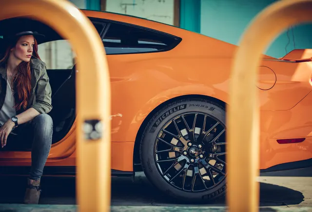 Ford Mustang automotive lifestyle shot, photographic, luxury, warm