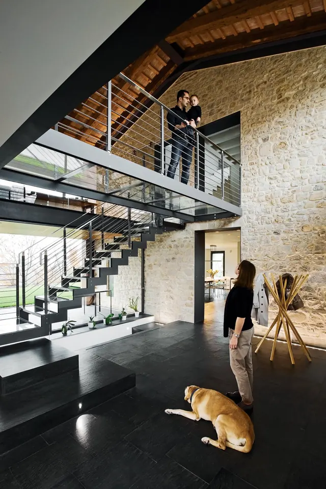 Modern farmhouse interior renovation with stone walls, photographic, warm