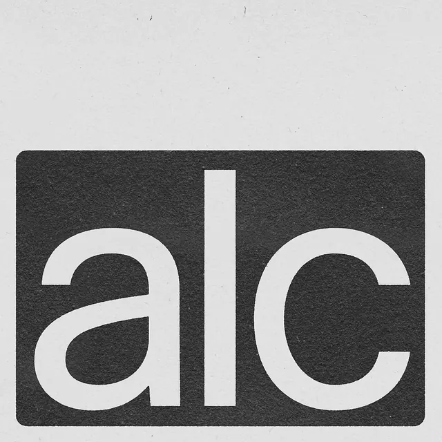 Lowercase alc wordmark on textured dark card, minimal, geometric, muted