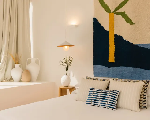 Warm minimalist bedroom with woven wall hanging, minimal, organic, warm