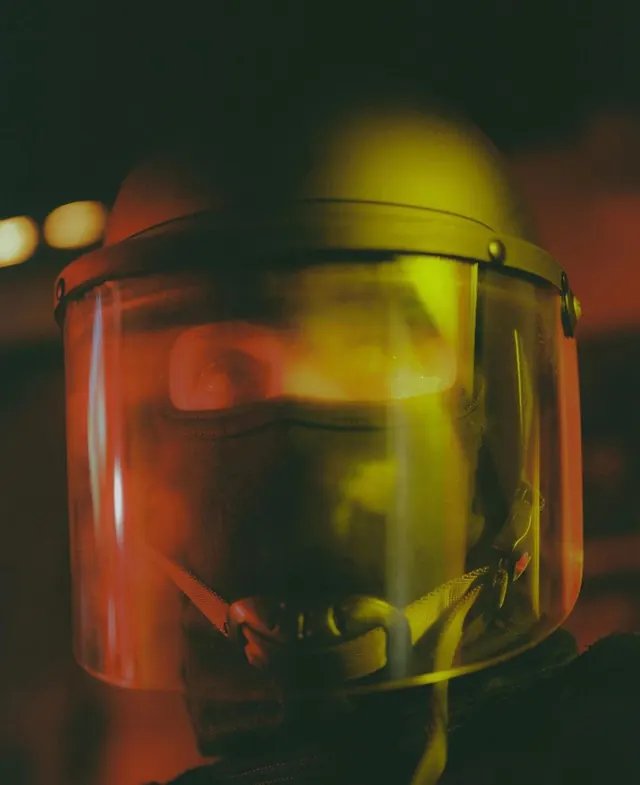 Safety helmet with colored gel overlay, photographic, technical, warm