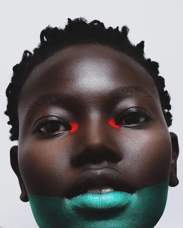 Bold neon portrait editorial makeup, photographic, bold, vibrant