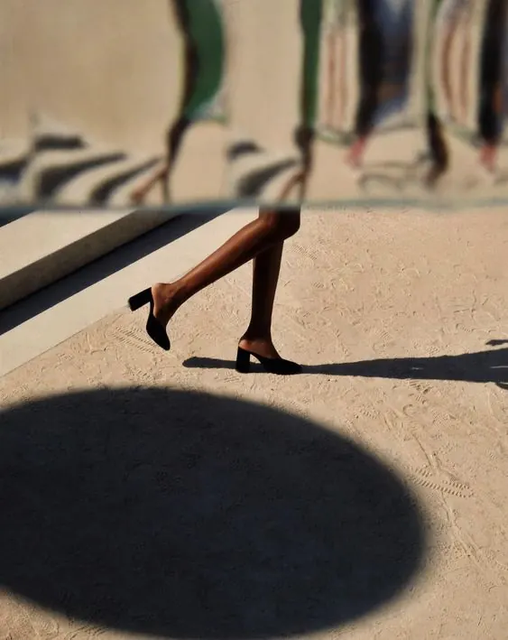 Beach legs shadow portrait, photographic, warm