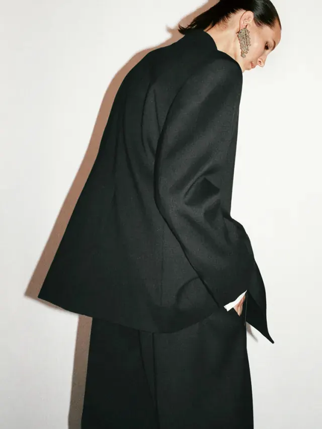 COS Atelier tailored blazer editorial shot, photographic, minimal, light