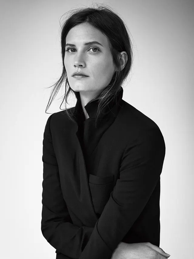 Black and white portrait headshot, photographic, minimal, monochrome