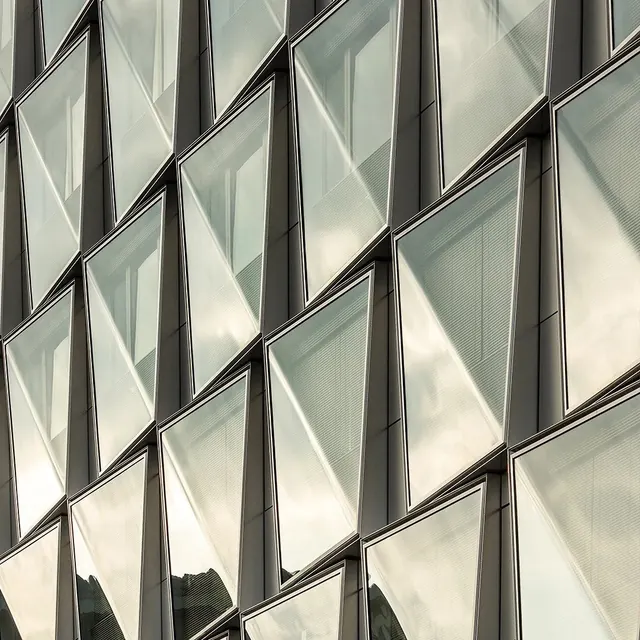 Modern glass office windows with shadow patterns, photographic, minimal, light