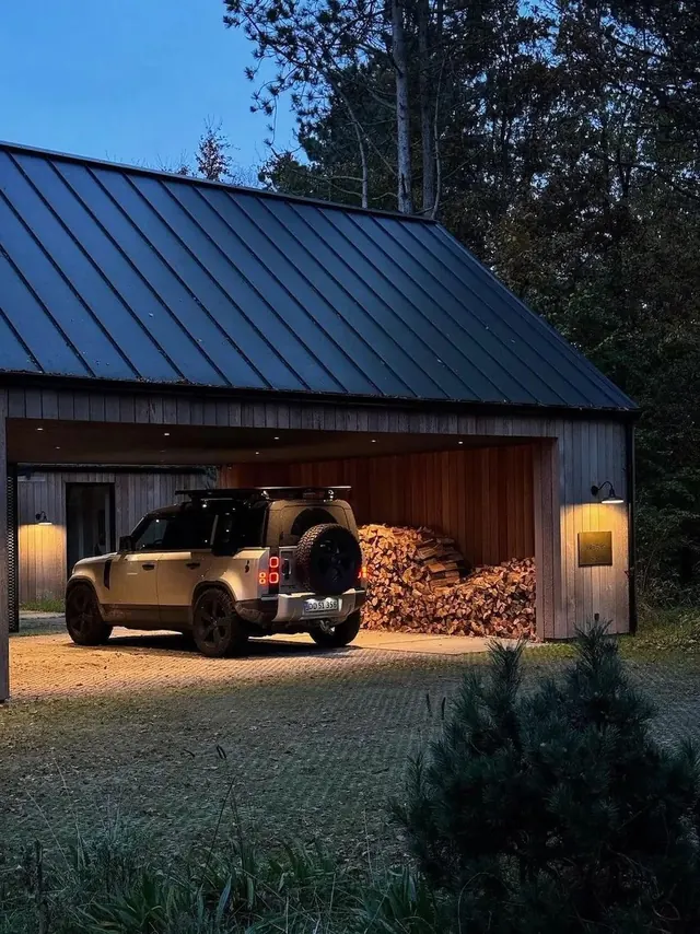 Modern garage with SUV and firewood, minimalist, corporate-clean, dark