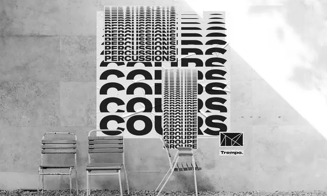 Street typographic mural with repeated text and geometric patterns, typographic, brutalist, monochrome