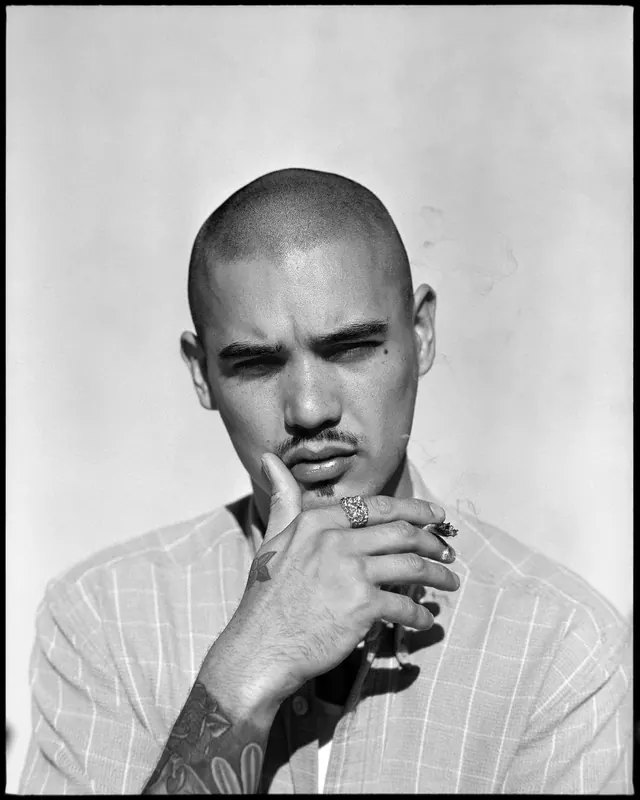 Black and white portrait with hand pose, photographic, minimal, monochrome