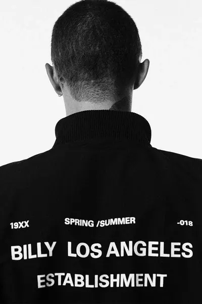 Fashion lookbook back portrait with text overlay, minimal, photographic, dark