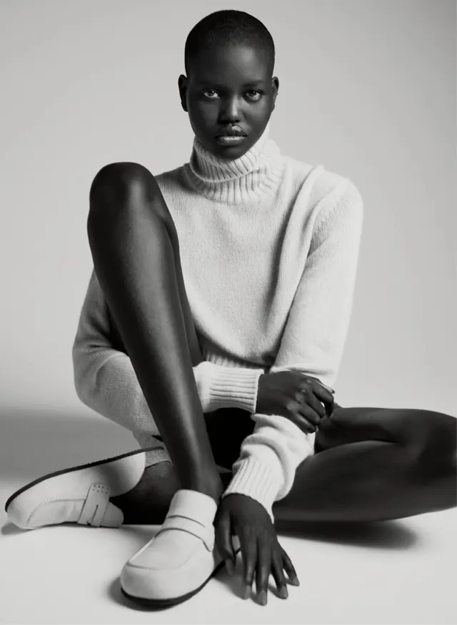 Fashion portrait in minimalist styling, minimal, photographic, dark