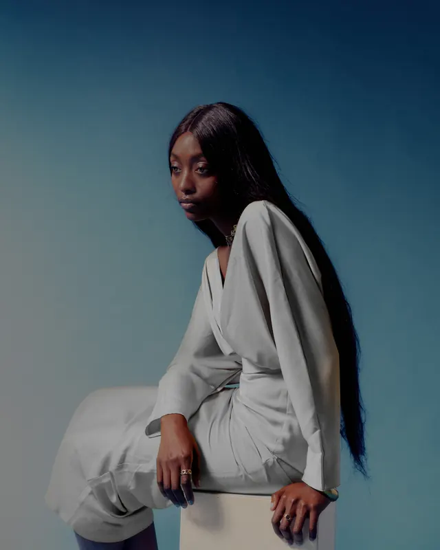 Portrait studio shot in cool teal, photographic, minimal, cool