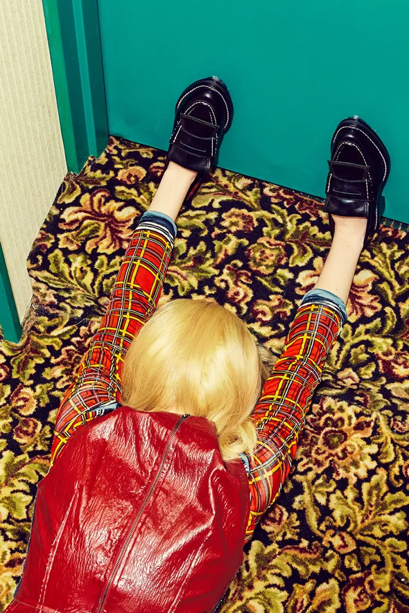 Overhead fashion styling with pattern mixing, photographic, editorial, vibrant