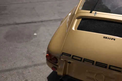 Classic Porsche side detail, minimal, photographic, warm