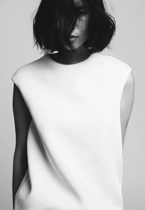 Minimalist black and white fashion portrait, minimal, monochrome, dark