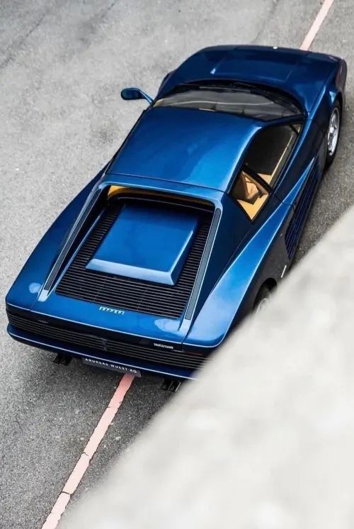 Blue sports car aerial overhead view, minimal, geometric, dark