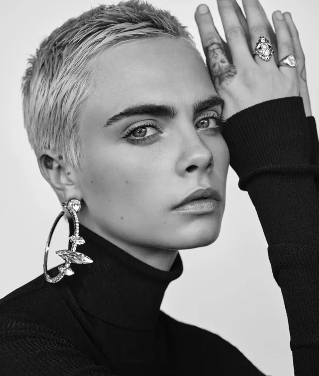 Portrait with layered jewelry, photographic, luxury, monochrome