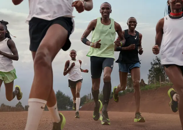 Nike running group on dirt track, photographic, warm
