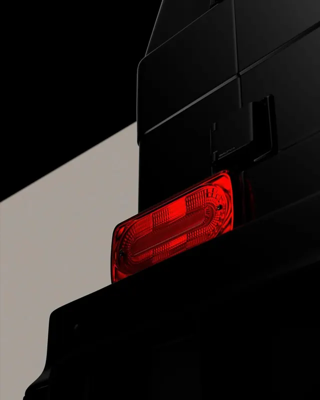 Tail light detail photograph, photographic, minimalist, dark