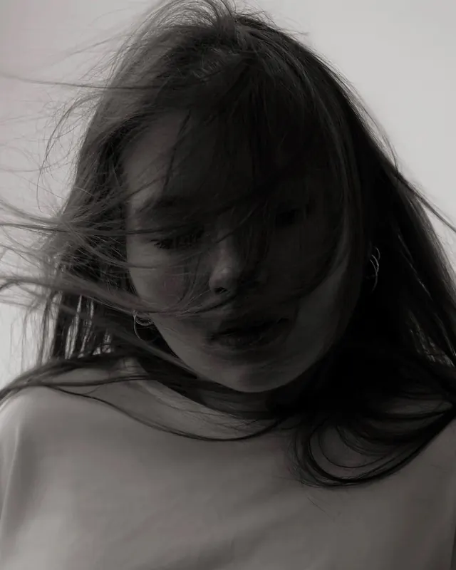Hair motion portrait study, photographic, minimal, light