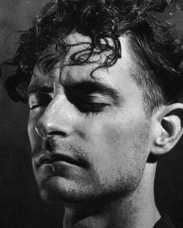 Black and white portrait study, photographic, monochrome, dark