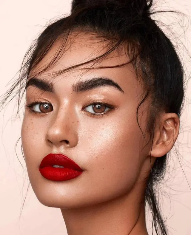 Beauty portrait with bold red lips and warm makeup, photographic, warm, warm