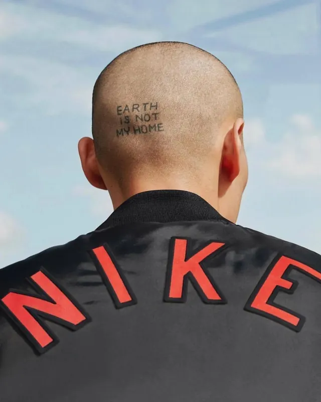 Nike athlete portrait with subtle face detail, photographic, minimalist, muted