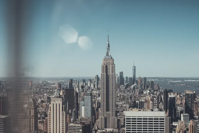 Aerial cityscape with Empire State Building, photographic, dark-mode, cool