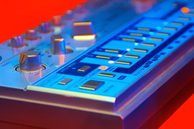 Audio mixer with neon backlighting, technical, gradient-heavy, vibrant