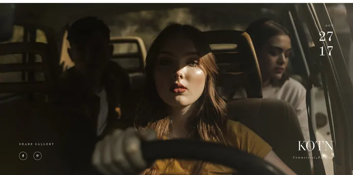 Figures in car interior with warm lighting and KOTN branding, photographic, editorial, warm