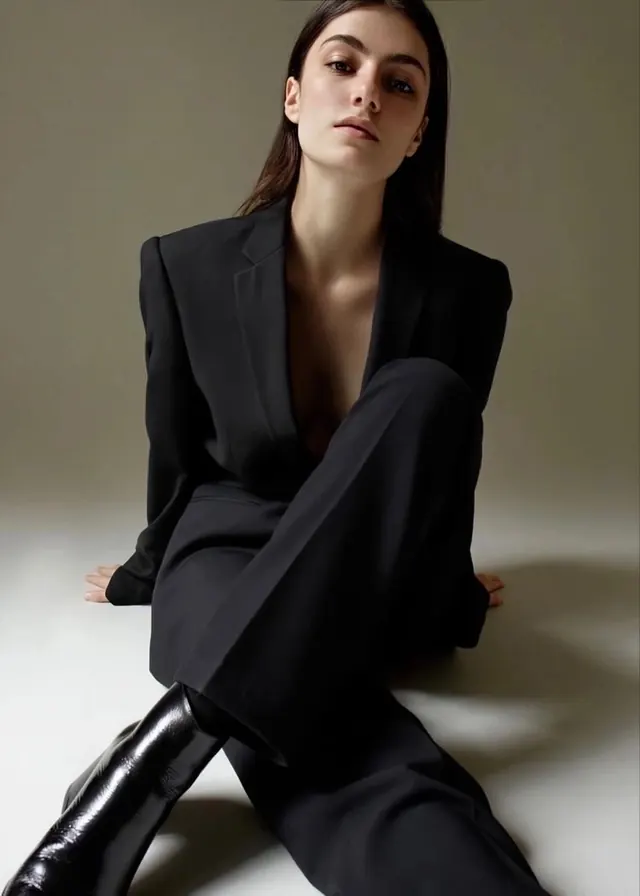 Minimal fashion portrait in black suit, photographic, minimal, dark