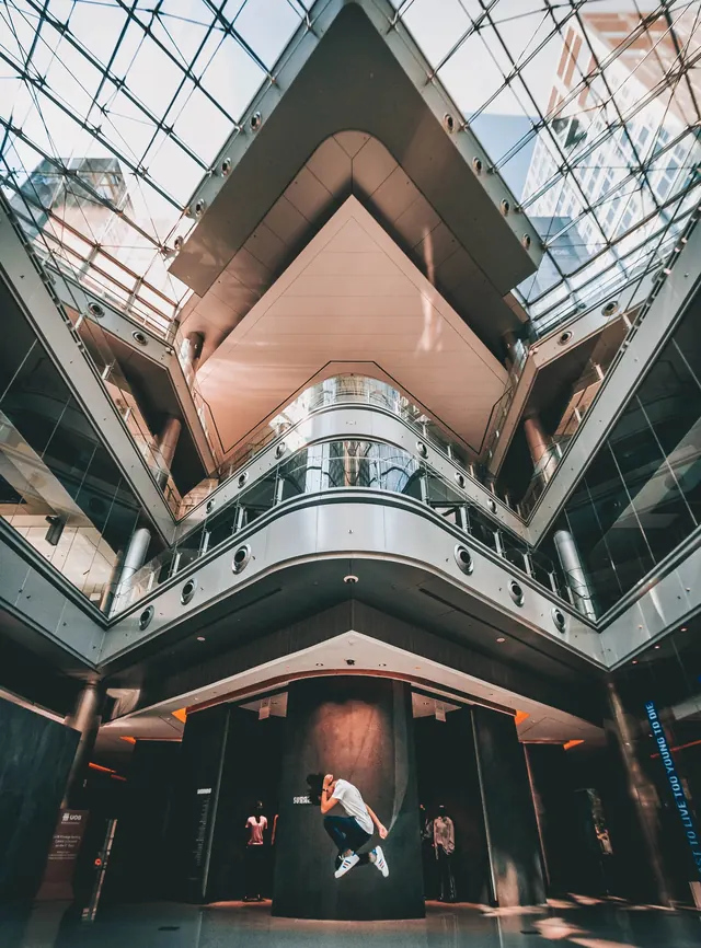Geometric museum interior with mirror symmetry, photographic, geometric, cool