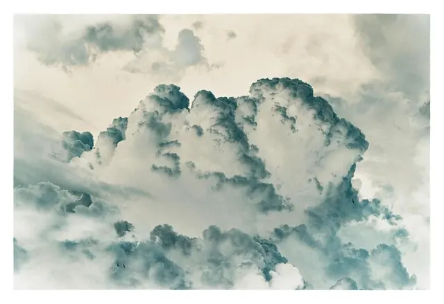 Dramatic cumulus cloud formation, photographic, organic, cool