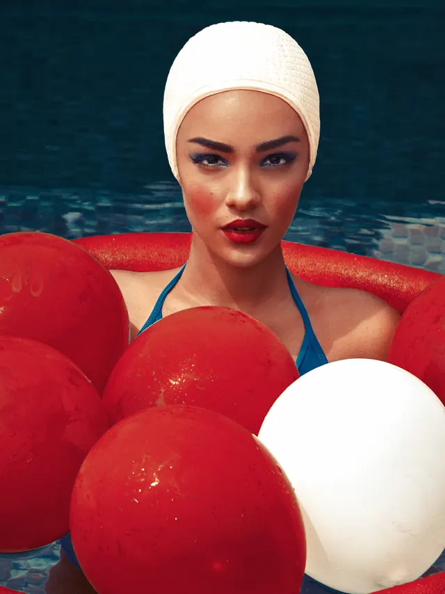 Pool portrait editorial styling, photographic, playful, dark