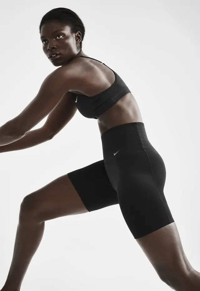 Nike sportswear product photography campaign, photographic, minimal, light