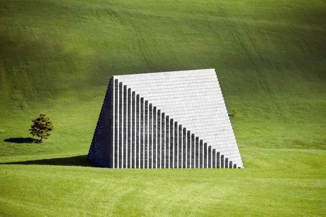 Minimalist architectural structure in landscape, minimal, geometric, light