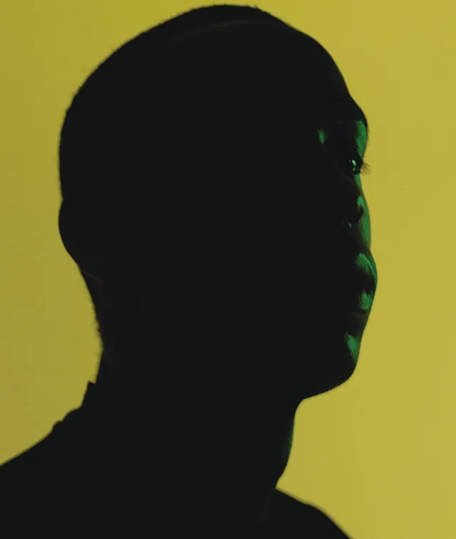 Silhouette portrait with lime background, minimal, dark-mode, dark